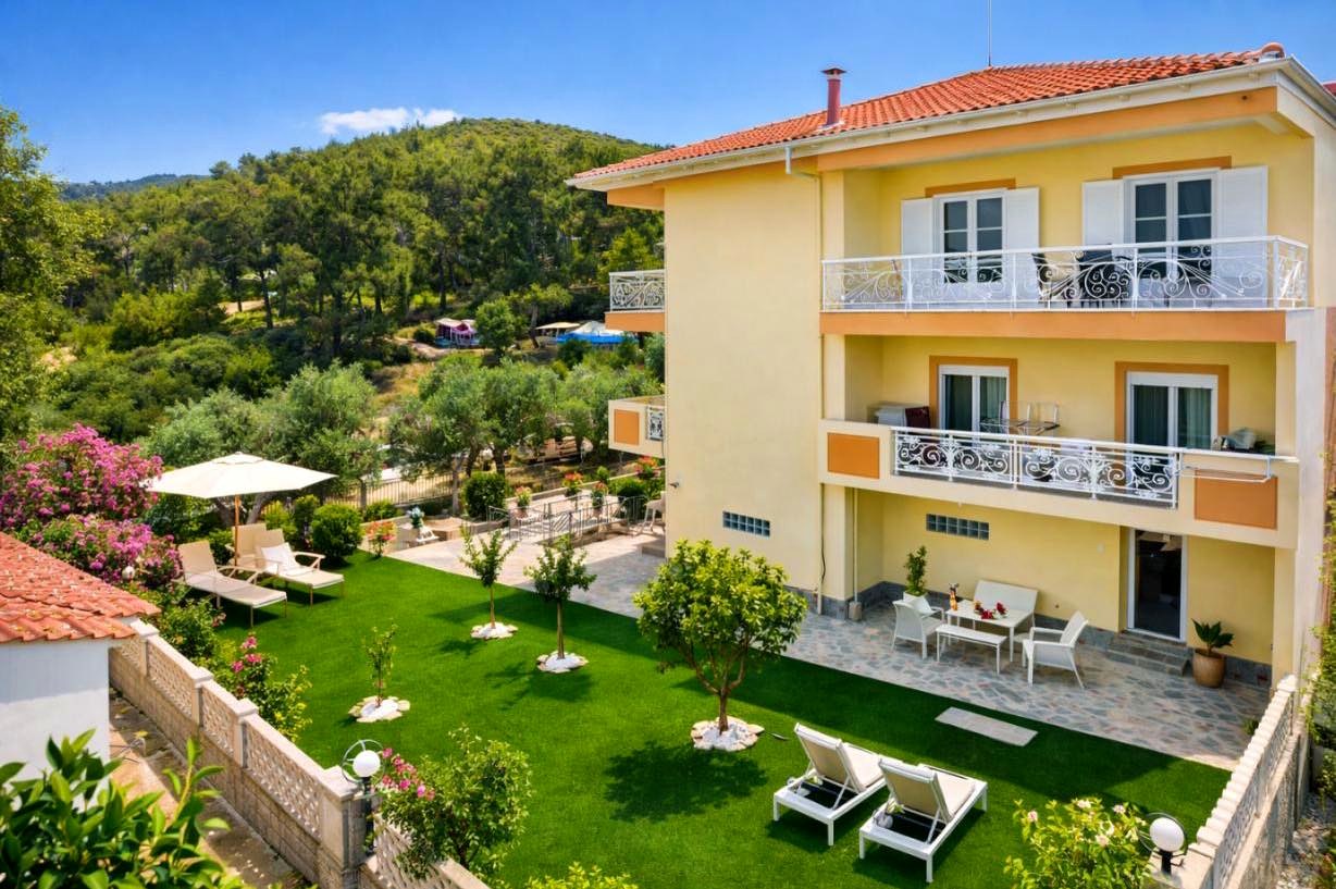 Villa Markos exterior with landscaped garden